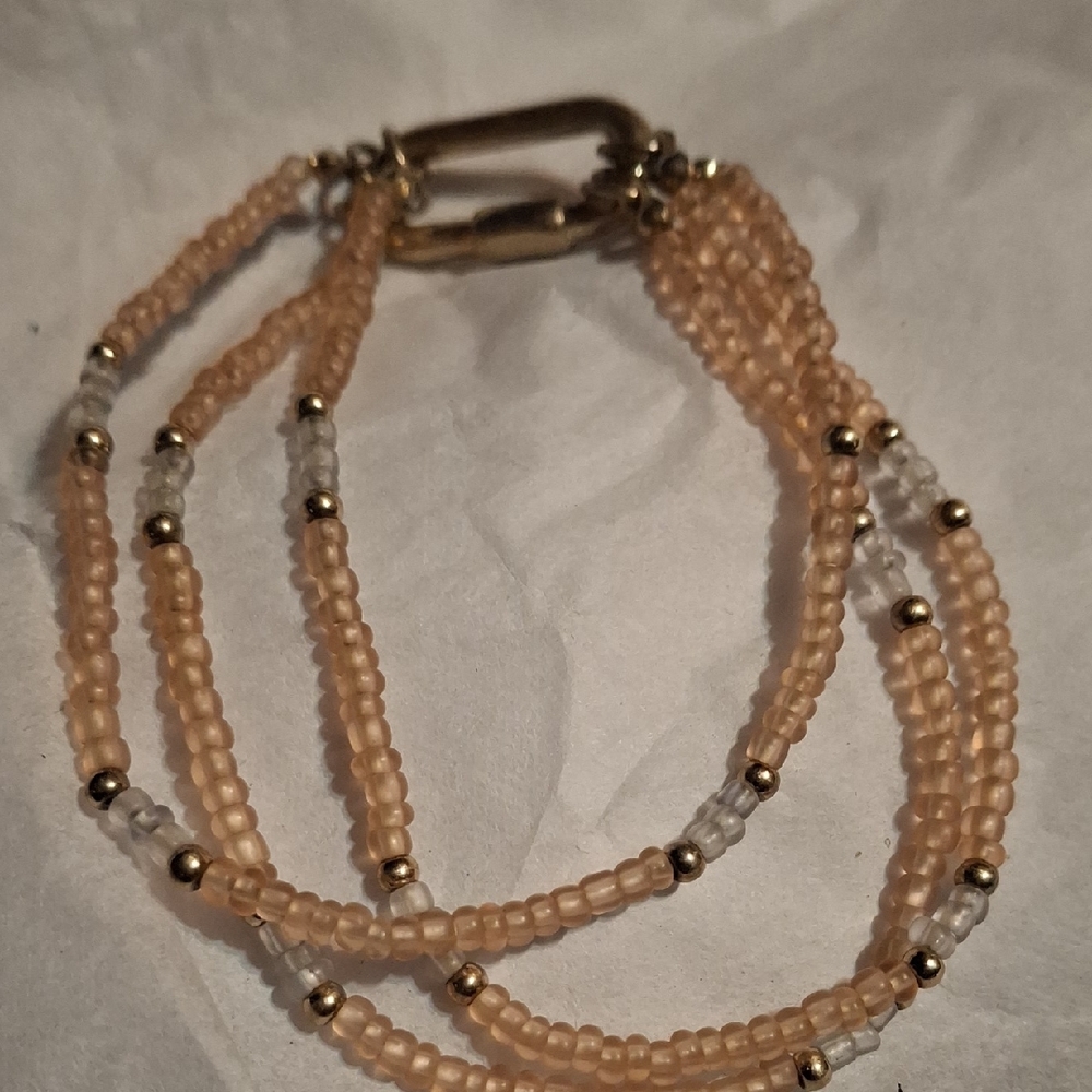 Elegant Beaded Bracelet with Gold Accents